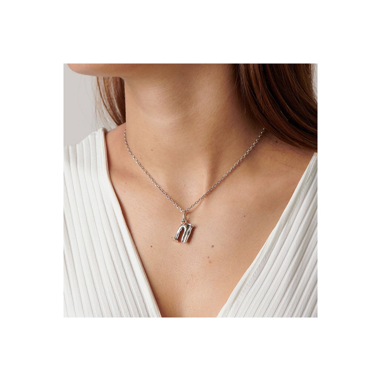 uno de 50 n´s 2.5mm little letter n metal charm clad with silver. charm only