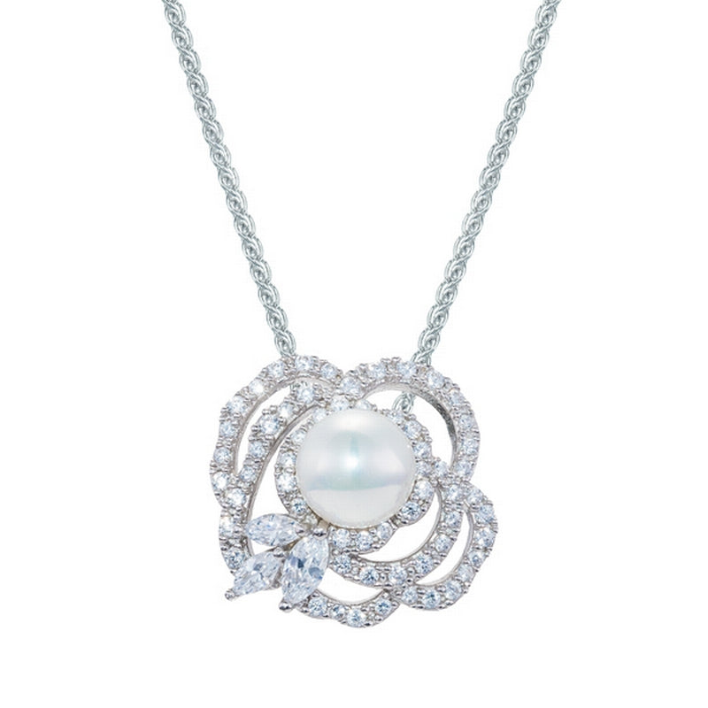 pendant stoneset outline of a flower with a pearl in the centre