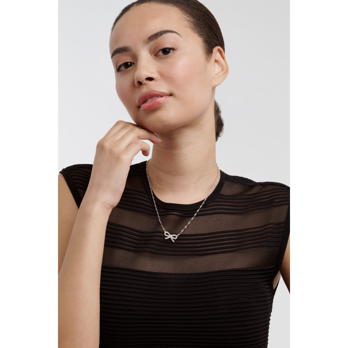 ted baker ribah: crystal silver tone ribbon bow pendant