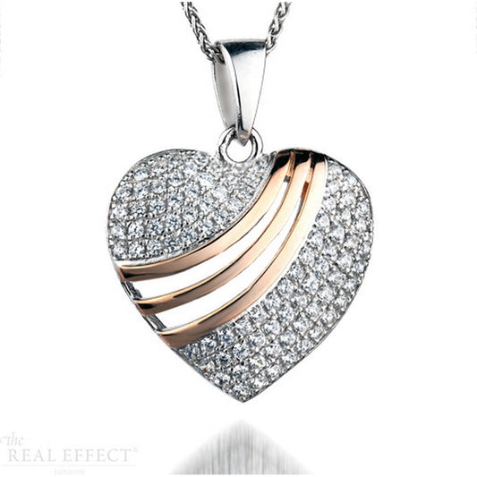 pave set, heart design pendant with tripple rose gold break.